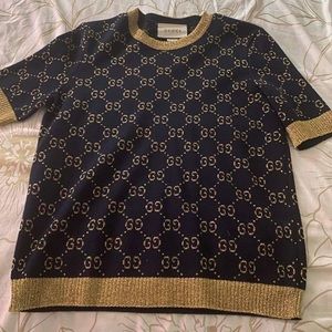 100% authentic beautiful navy blue and gold Gucci sweater size large in women’s.